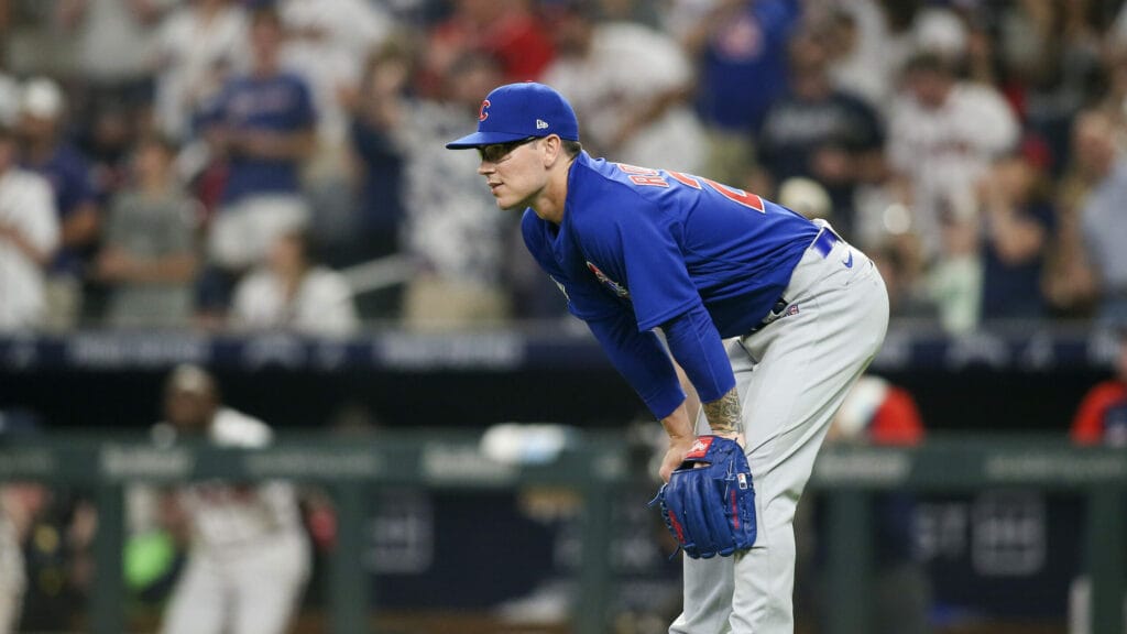 Chicago Cubs relief pitcher Ethan Roberts (21) reacts after giving up a home run to Atlanta Braves third baseman Austin Riley (not pictured) in the eighth inning at Truist Park.