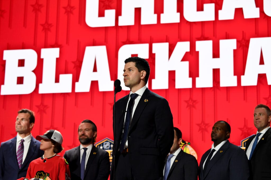 Jun 28, 2023; Nashville, Tennessee, USA; Chicago Blackhawks general manager Kyle Davidson makes the nineteenth pick in round one of the 2023 NHL Draft at Bridgestone Arena.