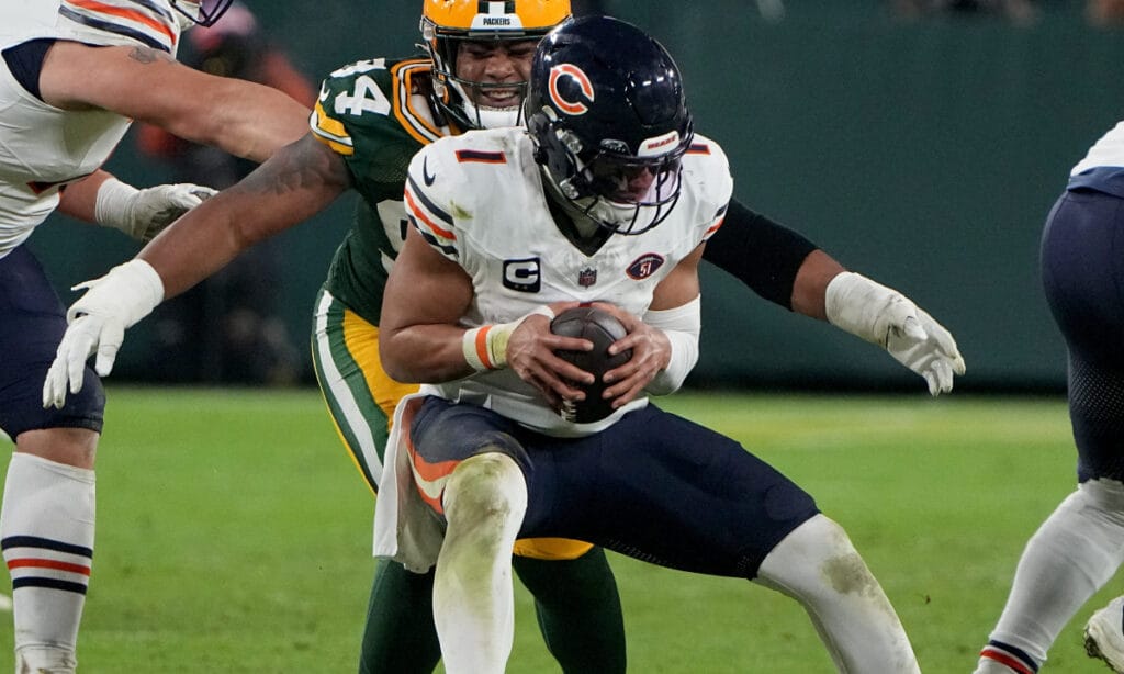 Justin Fields is tackled in Week 18, 2023 against the Green Bay Packers