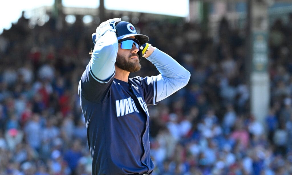 Cubs 3B Patrick Wisdom places his hands on his head after flying out to the warning track.