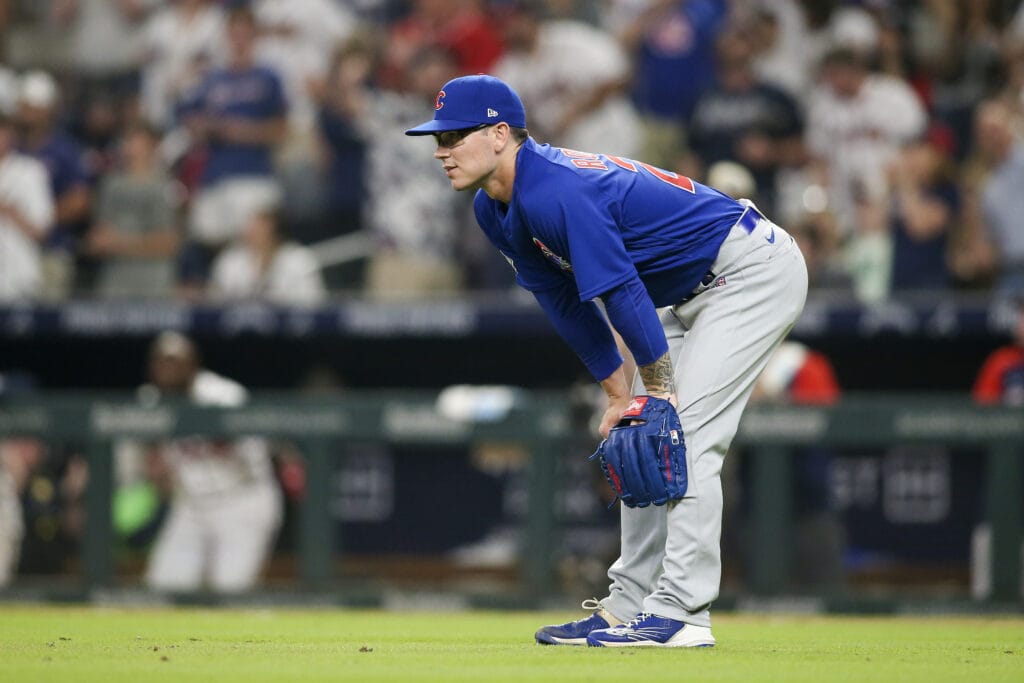 Chicago Cubs relief pitcher Ethan Roberts (21) reacts after giving up a home run to Atlanta Braves third baseman Austin Riley (not pictured) in the eighth inning at Truist Park.