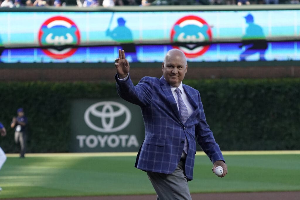 Chicago Cubs Hall of Fame player Ryne Sandberg throws out a ceremonial first pitch before the game between the Chicago Cubs and the New York Mets at Wrigley Field.