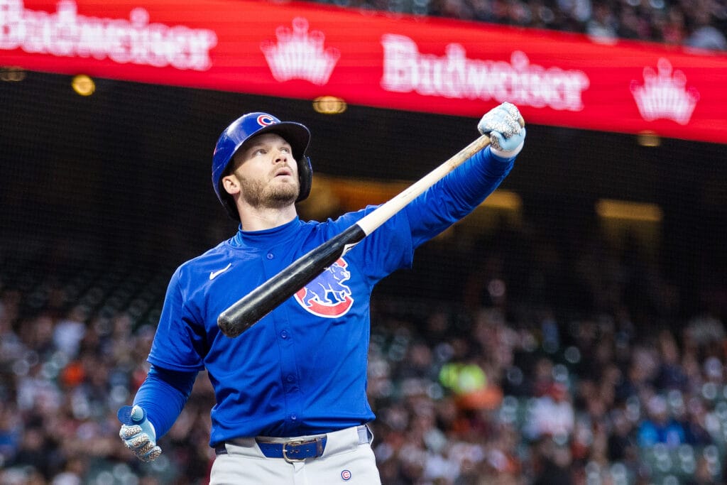 Chicago Cubs left fielder Ian Happ (8) watches a foul ball during the sixth inning of the game against the San Francisco Giants at Oracle Park.