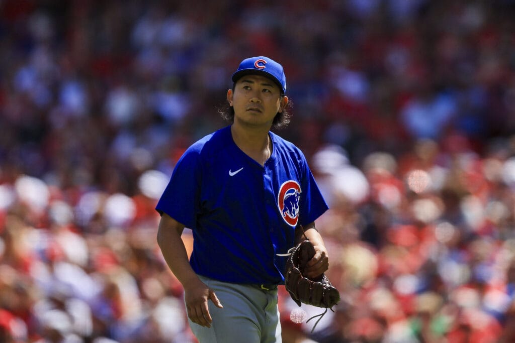 Chicago Cubs starting pitcher Shota Imanaga (18) walks off the field during a pitching change in the seventh inning against the Cincinnati Reds at Great American Ball Park.