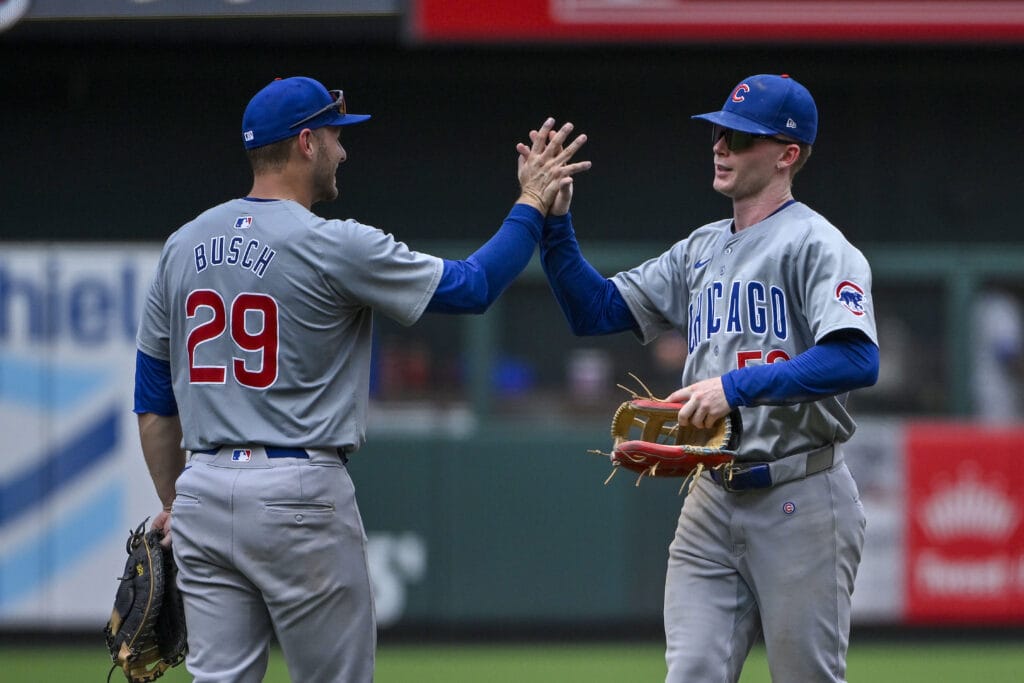 Chicago Cubs center fielder Pete Crow-Armstrong (52) celebrates with first baseman Michael Busch (29) after the Cubs defeated the St. Louis Cardinals at Busch Stadium.