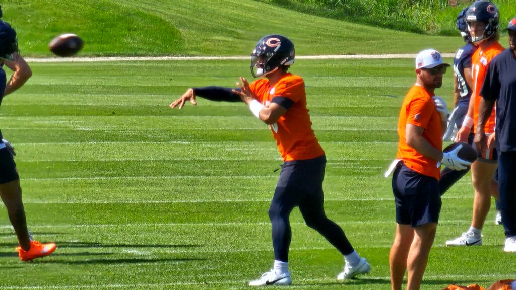 Bears QB Caleb Williams releases a pass at Halas Hall