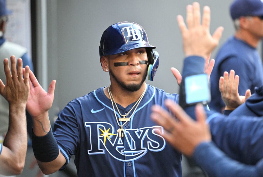 ampa Bay Rays first baseman Isaac Paredes (17) celebrates in the dugout with teammates after scoring a run against the Toronto Blue Jays in the seventh inning at Rogers Centre.