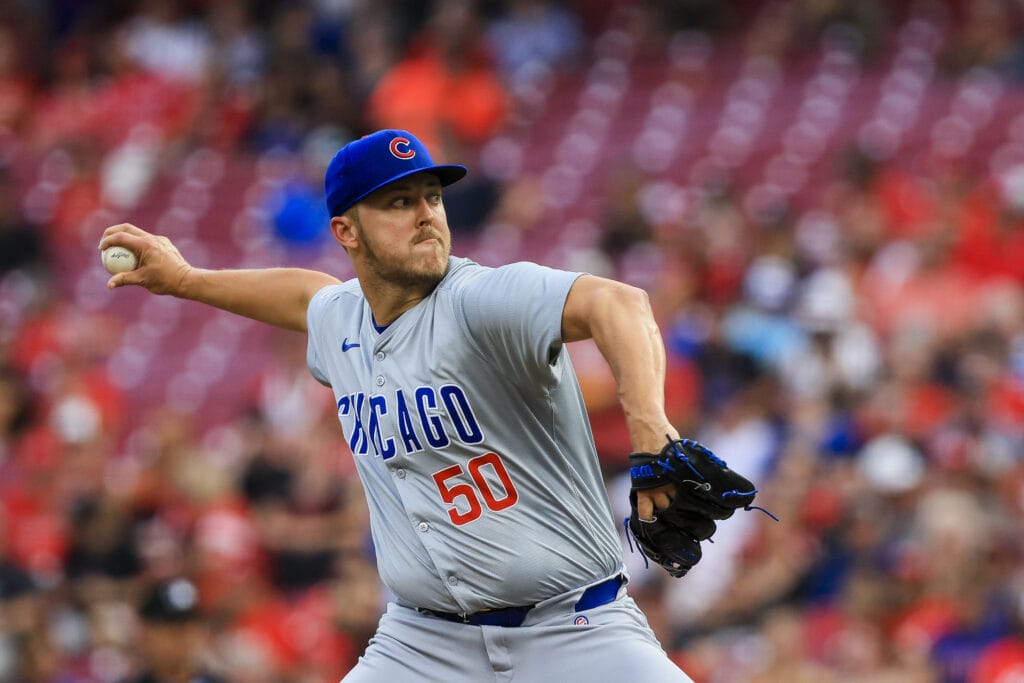 Chicago Cubs starting pitcher Jameson Taillon (50) pitches against the Cincinnati Reds in the second inning at Great American Ball Park.