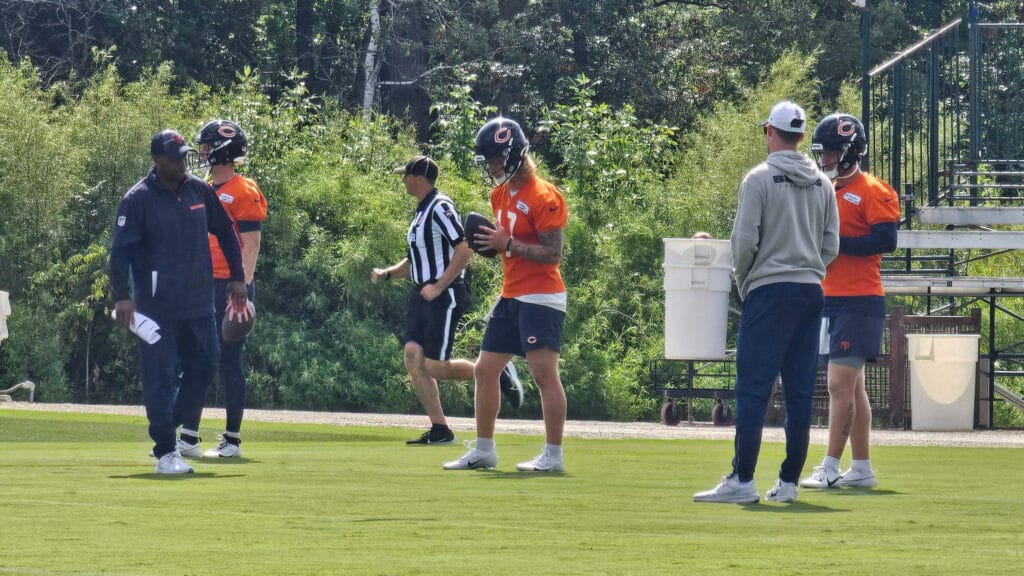 Bears QB Brett Rypien, Tyson Bagent, and Austin Reed warm up in training camp on Wednesday.