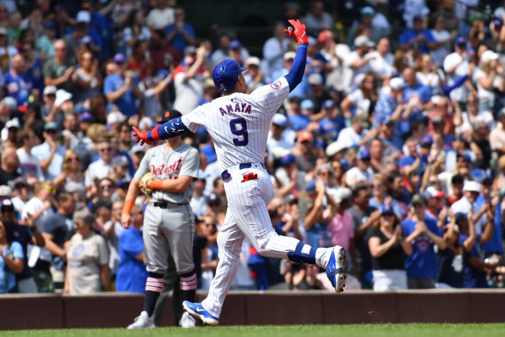 Chicago Cubs catcher Miguel Amaya (9) celebrates his grand slam while rounding the bases during the second inning against the Detroit Tigers at Wrigley Field.