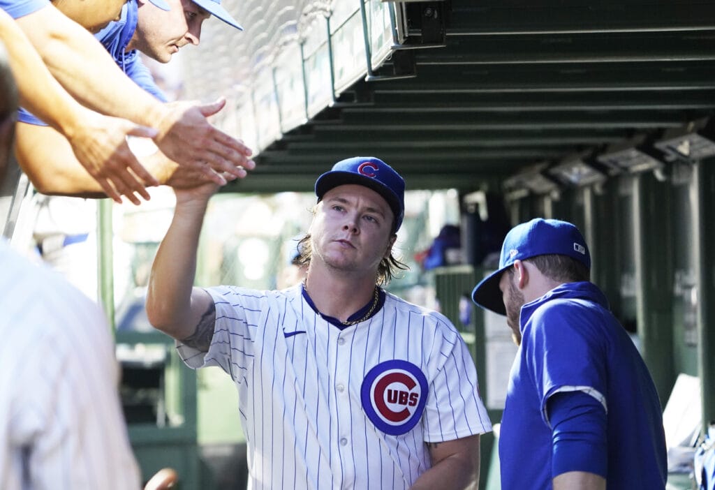 Chicago Cubs pitcher Justin Steele (35) is greeted in the dugout after leaving the game against the St. Louis Cardinals during the seventh inning at Wrigley Field.
