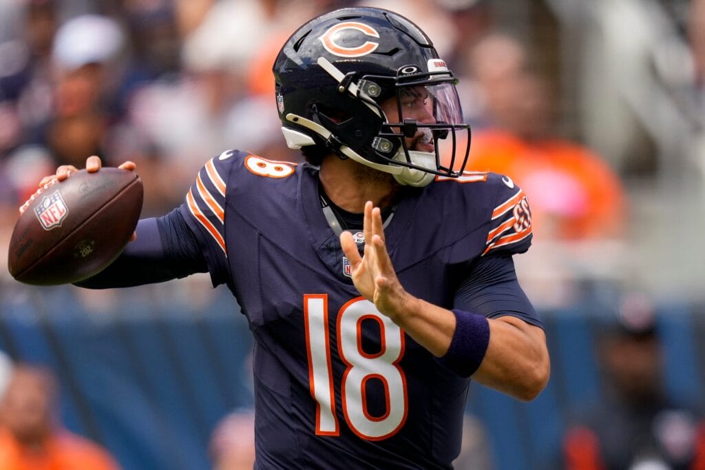 Bears' Caleb Williams cocks back to throw