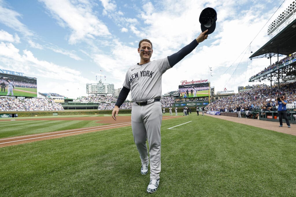 New York Yankees first baseman Anthony Rizzo (48) waves to fans as he is introduced before a baseball game against the Chicago Cubs at Wrigley Field.