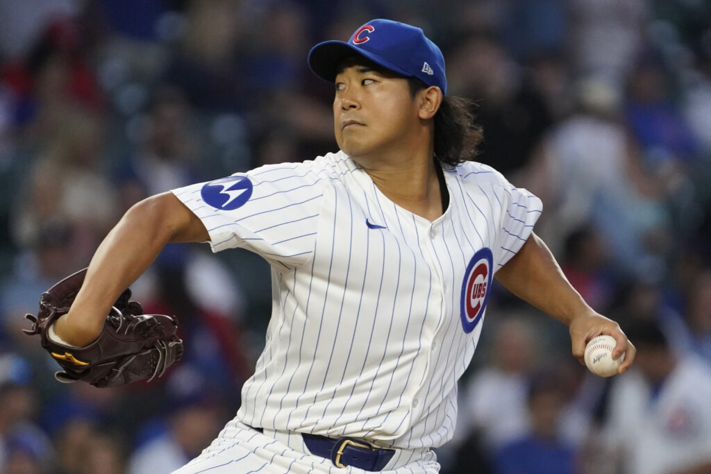 Chicago Cubs pitcher Shota Imanaga (18) throws the ball against the Oakland Athletics during the first inning at Wrigley Field.