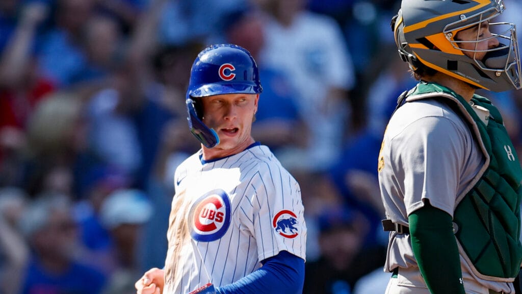 Chicago Cubs outfielder Pete Crow-Armstrong (52) scores against the Oakland Athletics during the fifth inning at Wrigley Field.