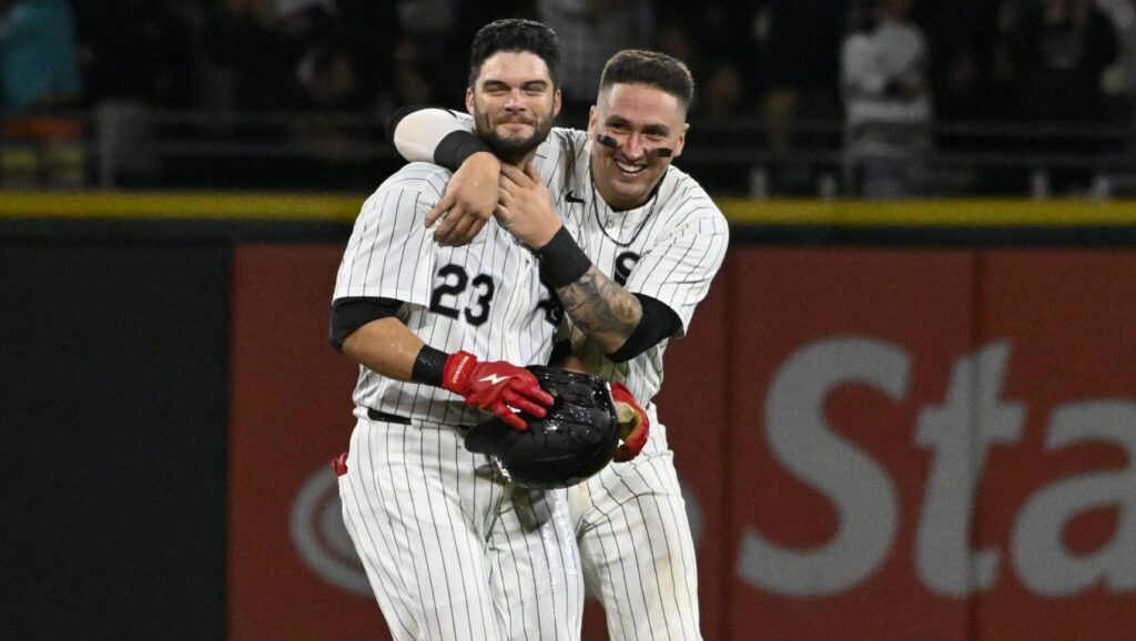Andrew Benintendi and Korey Lee celebrate a White Sox walk-off win