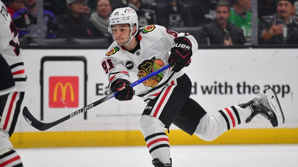 Apr 18, 2024; Los Angeles, California, USA; Chicago Blackhawks center Frank Nazar (91) shoots on goal against the Los Angeles Kings during the first period at Crypto.com Arena.