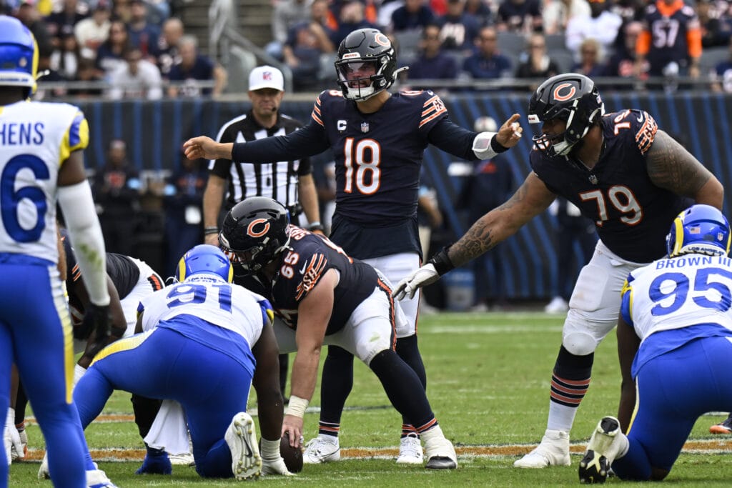 Bears quarterback Caleb Williams at the line of scrimmage