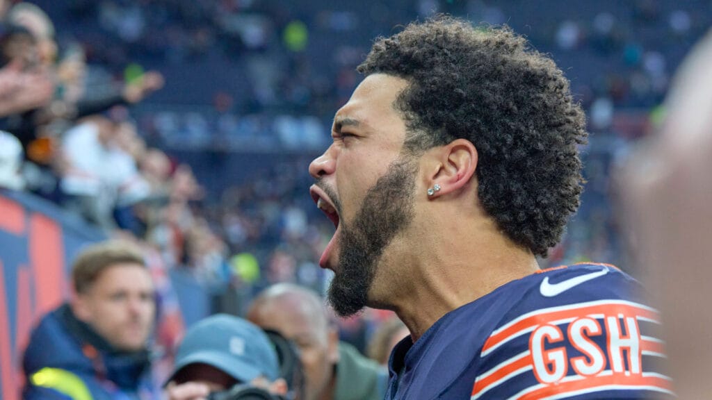 Caleb Williams shouts in excitement after Bears win