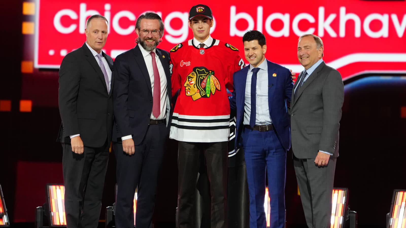 Jun 28, 2024; Las Vegas, Nevada, USA; Sacha Boisvert is selected by the Chicago Blackhawks with the 18th overall pick in the first round of the 2024 NHL Draft at The Sphere.