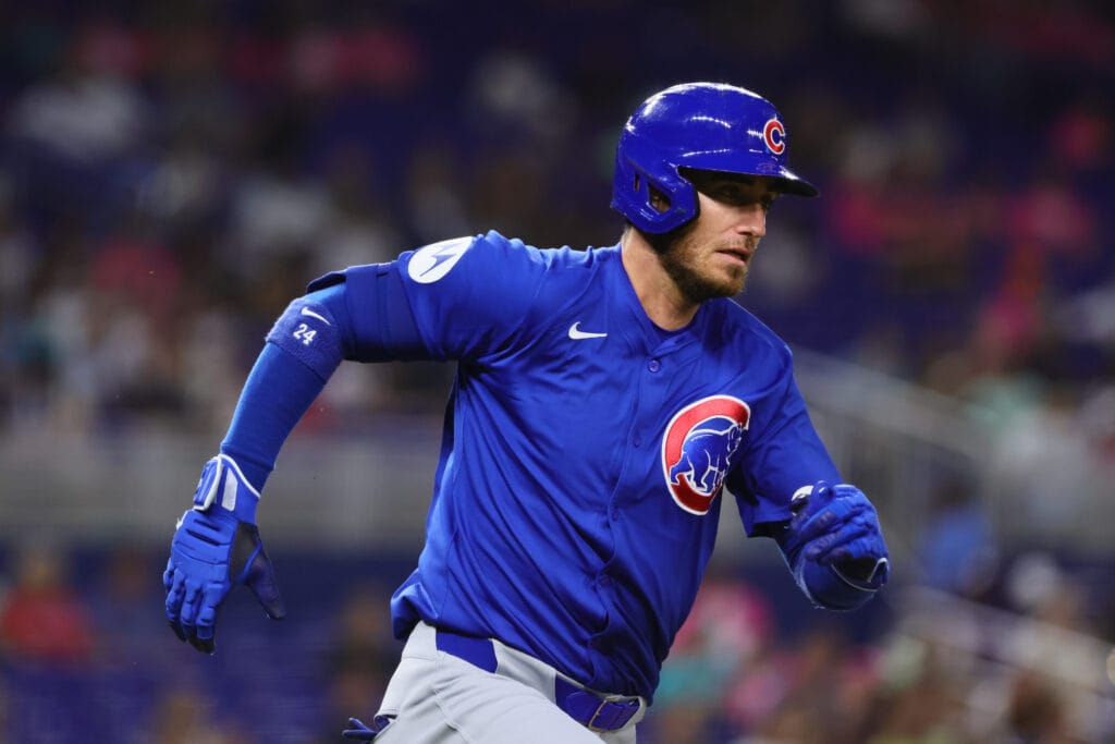 Chicago Cubs right fielder Cody Bellinger (24) runs toward second base after hitting a double against the Miami Marlins during the fifth inning at loanDepot Park.