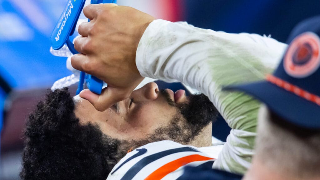 Chicago Bears quarterback Caleb Williams visibly frustrated on the bench during Sunday's loss to the Arizona Cardinals.