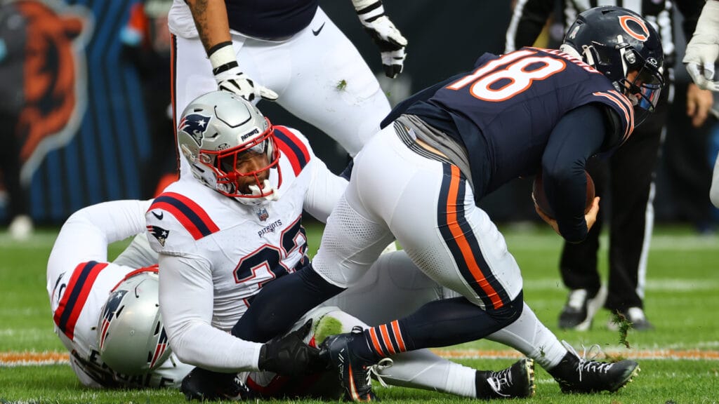Chicago Bears quarterback Caleb Williams is sacked against the New England Patriots