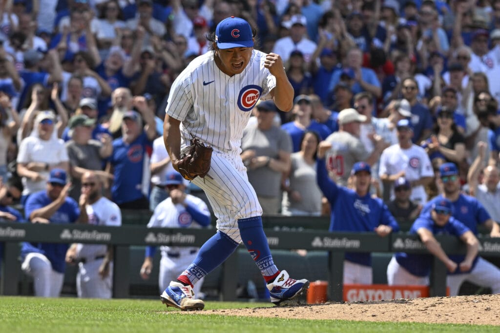 Chicago Cubs pitcher Shota Imanaga (18) reacts after closing out the seventh inning against the St. Louis Cardinals at Wrigley Field.