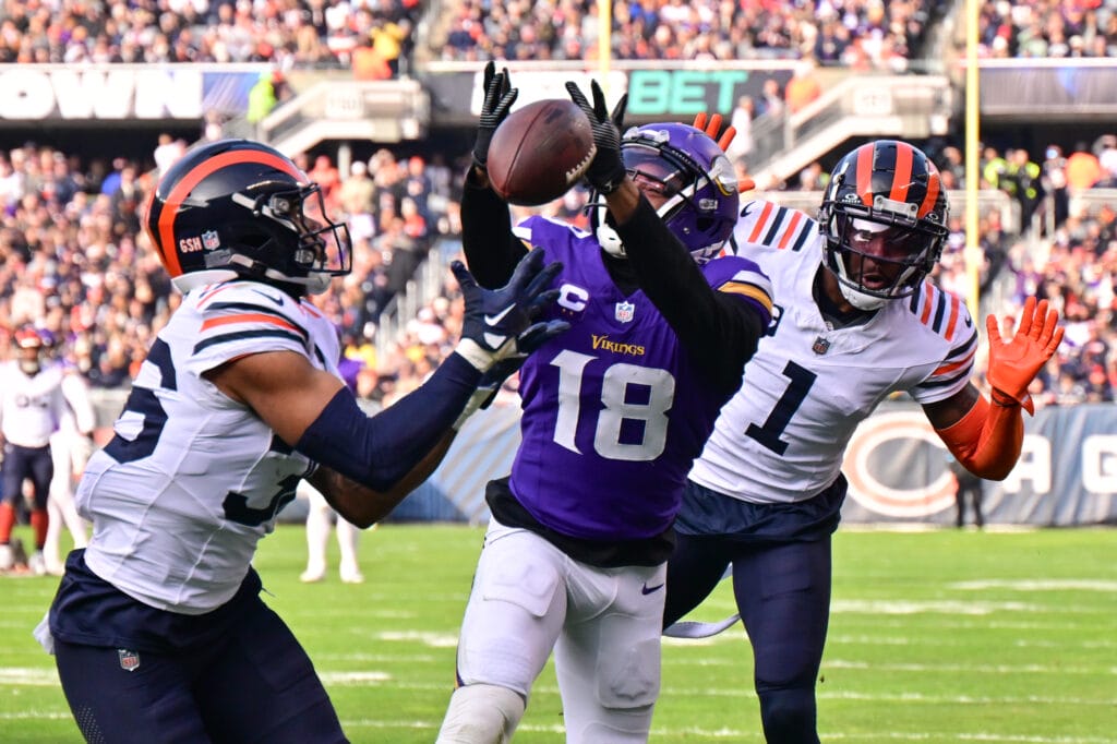 Chicago Bears' Jaylon Johnson and Jonathan Owens defend Minnesota Vikings' Justin Jefferson