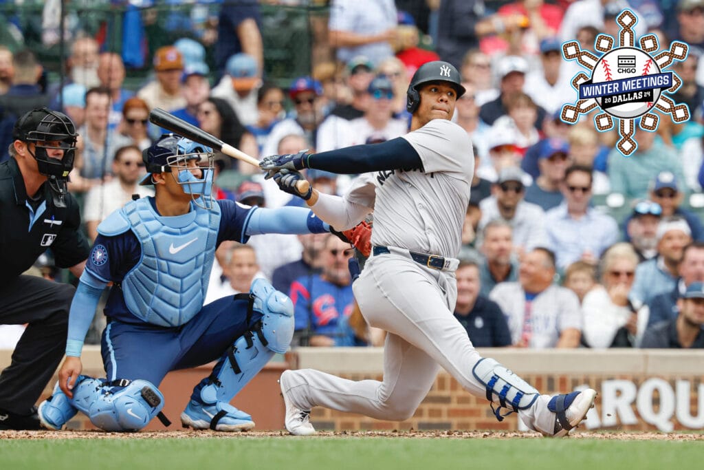 New York Yankees outfielder Juan Soto (22) singles against the Chicago Cubs during the third inning at Wrigley Field.