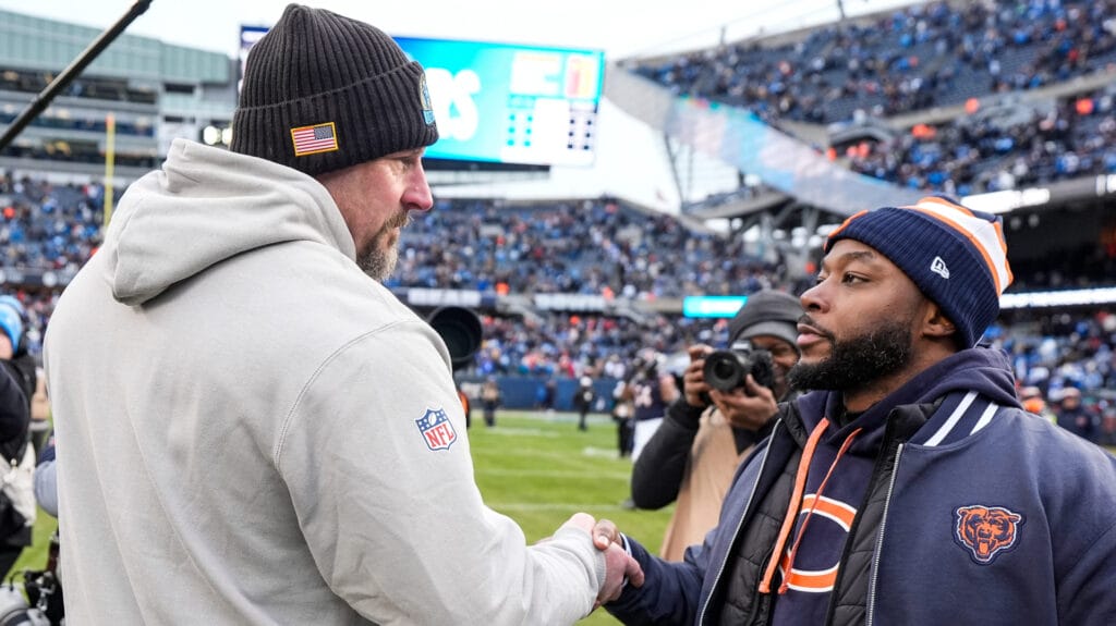 Chicago Bears head coach Thomas Brown greets Detroit Lions head coach Dan Campbell