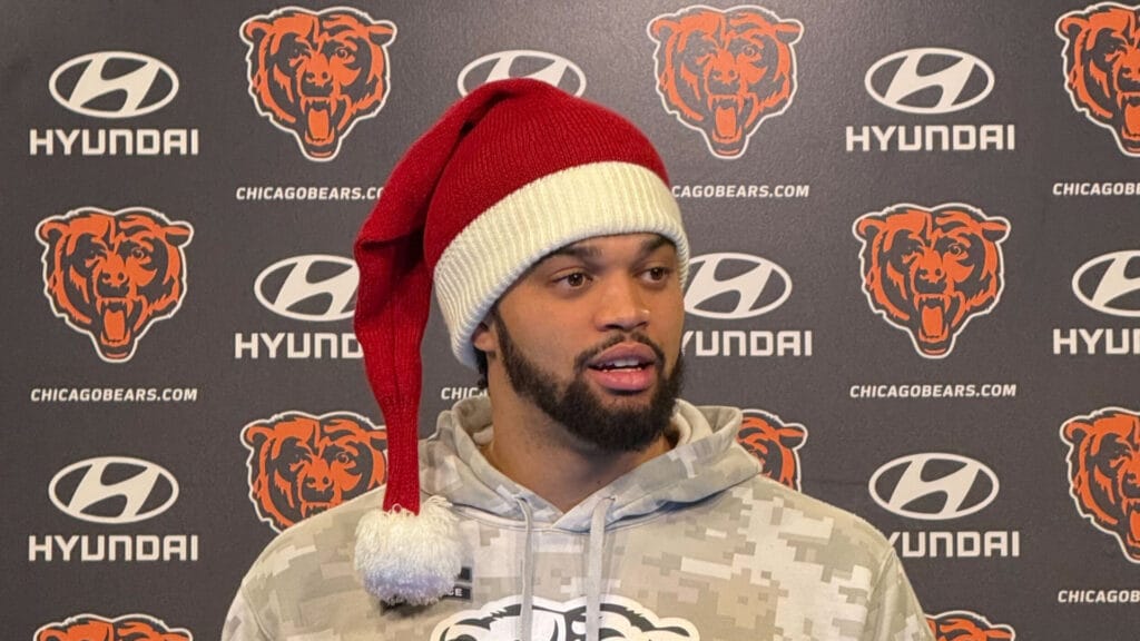 Chicago Bears quarterback Caleb Williams wearing a Santa hat