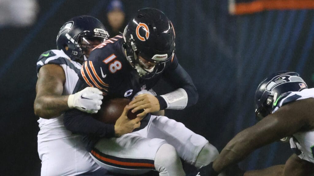 Chicago Bears quarterback Caleb Williams is sacked.
