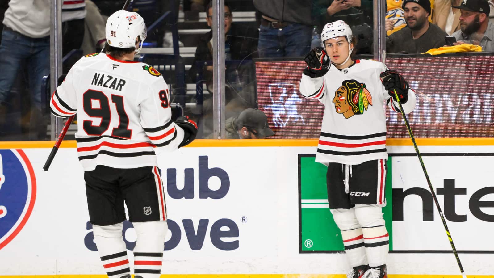 Jan 16, 2025; Nashville, Tennessee, USA; Chicago Blackhawks center Connor Bedard (98) celebrates his goal with center Frank Nazar (91) against the Nashville Predators during the second period at Bridgestone Arena.