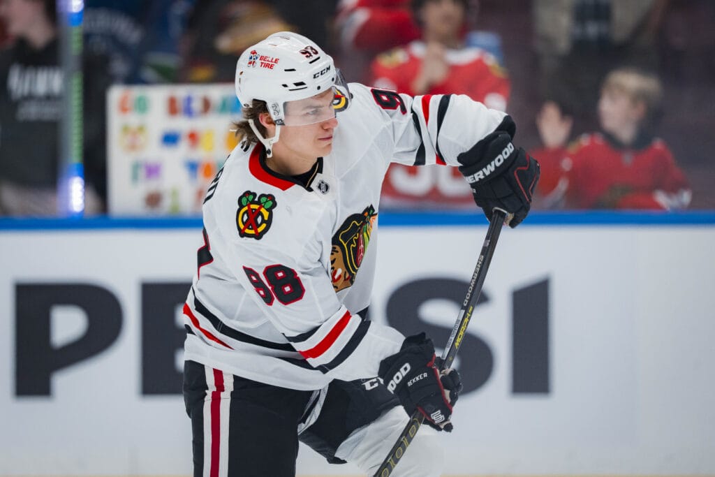 Mar 15, 2025; Vancouver, British Columbia, CAN; Chicago Blackhawks forward Connor Bedard (98) shoots during warm up prior to a game against the Vancouver Canucks at Rogers Arena. Mandatory Credit: Bob Frid-Imagn Images