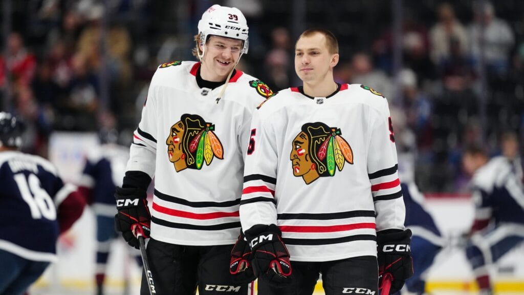 Mar 10, 2025; Denver, Colorado, USA; Chicago Blackhawks defenseman Ethan Del Mastro (38) and defenseman Artyom Levshunov (55) before the game against the Colorado Avalanche at Ball Arena.