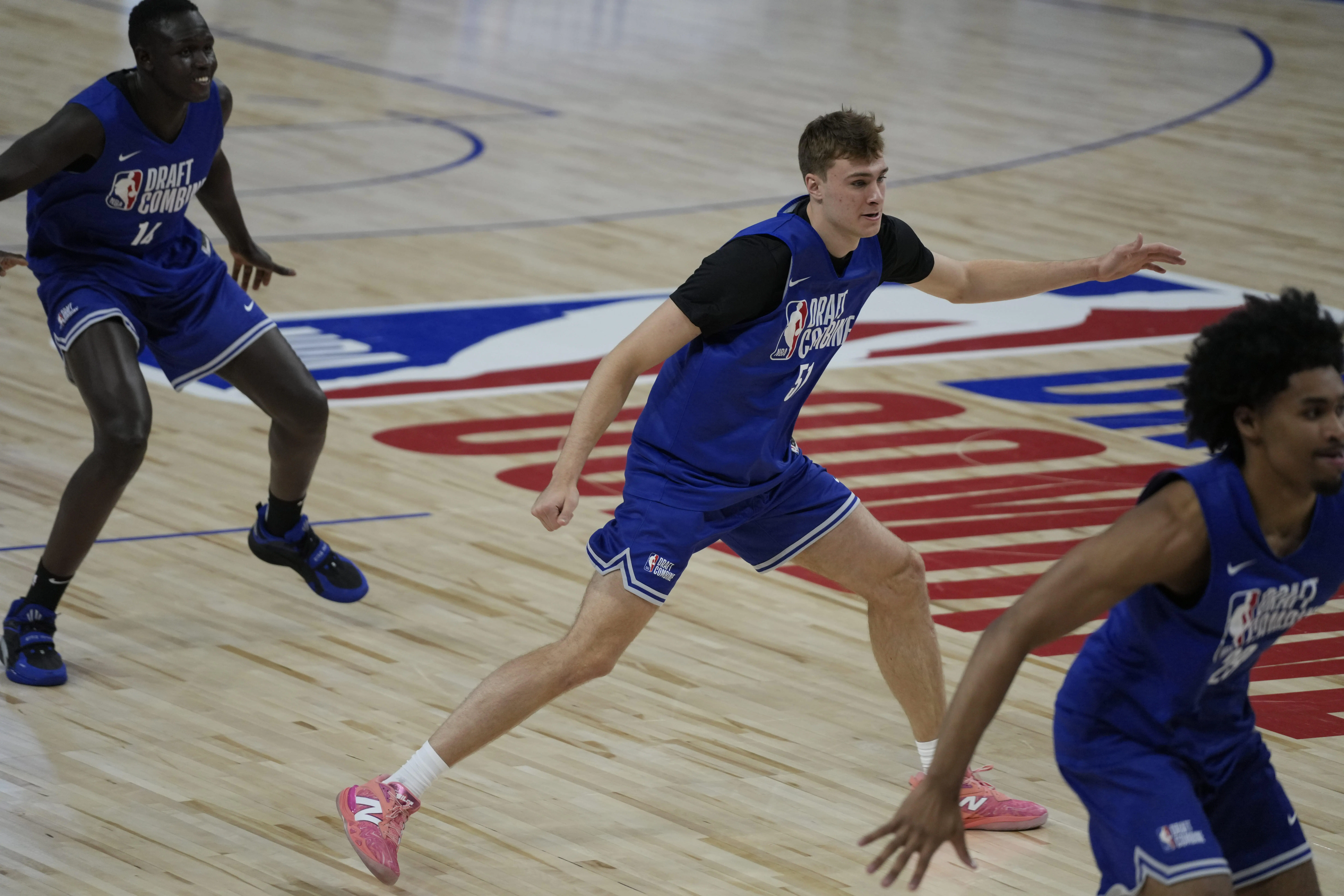 Cooper Flagg and Dylan Harper warm up at the NBA Combine. How will measurements and workouts change the draft board?