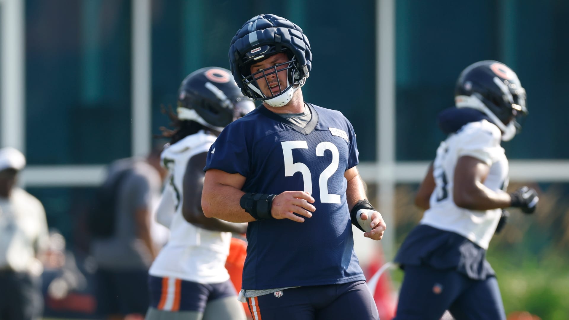 Chicago Bears center Drew Dalman (52) runs during training camp at Halas Hall.