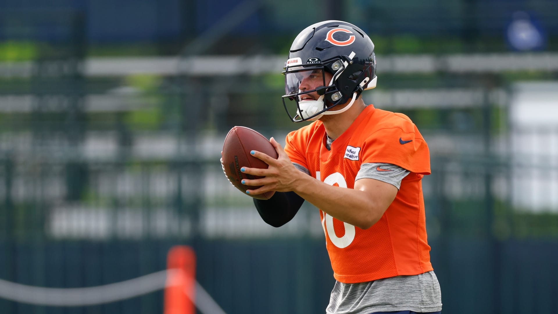 Chicago Bears quarterback Caleb Williams (18) looks to pass the ball during training camp at Halas Hall.