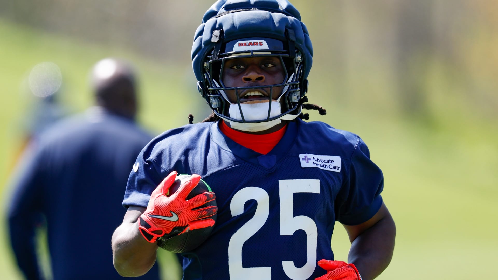Chicago Bears running back Kyle Monangai (25) runs with the ball during the Rookie Minicamp at Halas Hall.