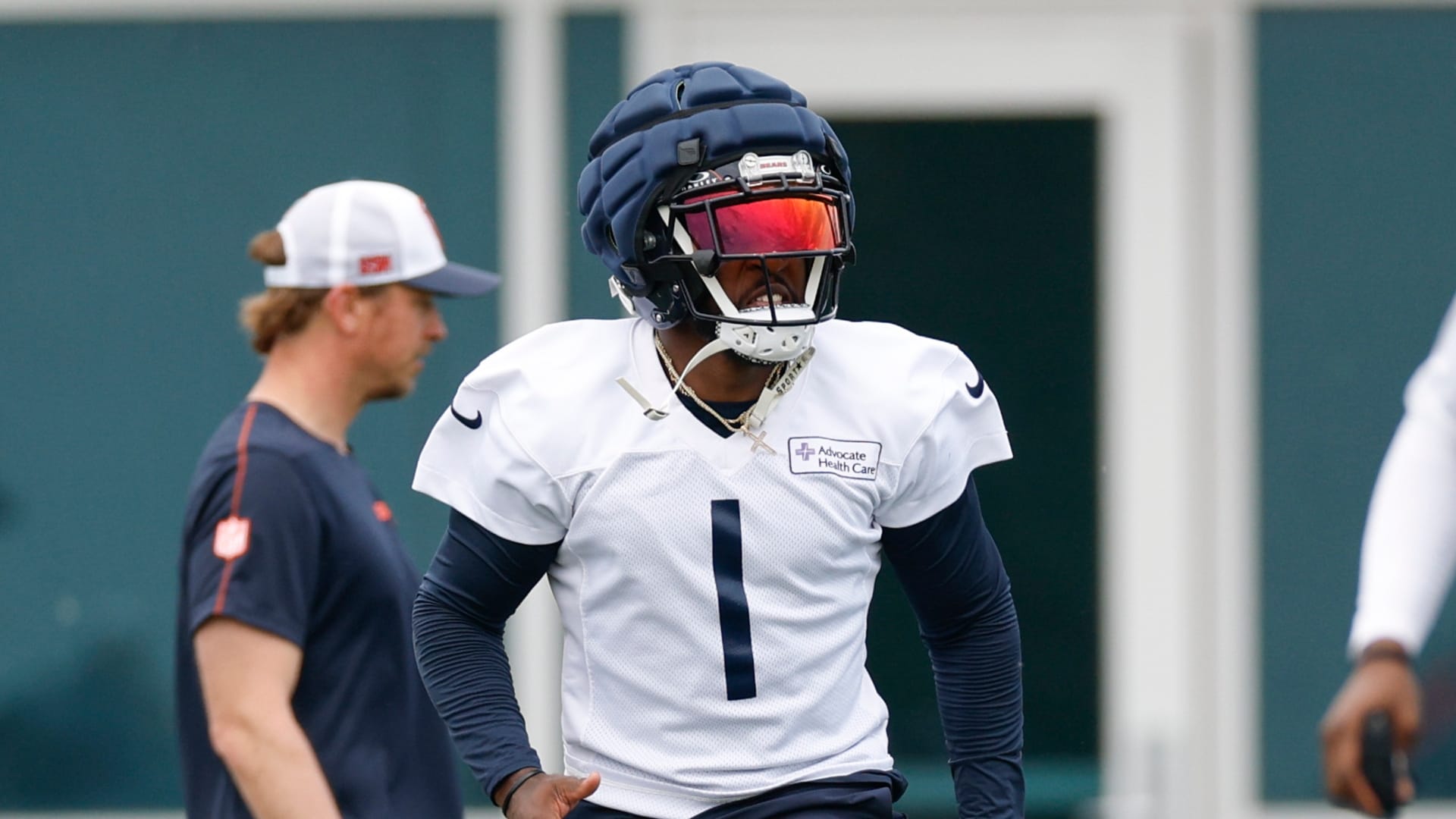 Chicago Bears cornerback Jaylon Johnson (1) warms up during minicamp at Halas Hall.