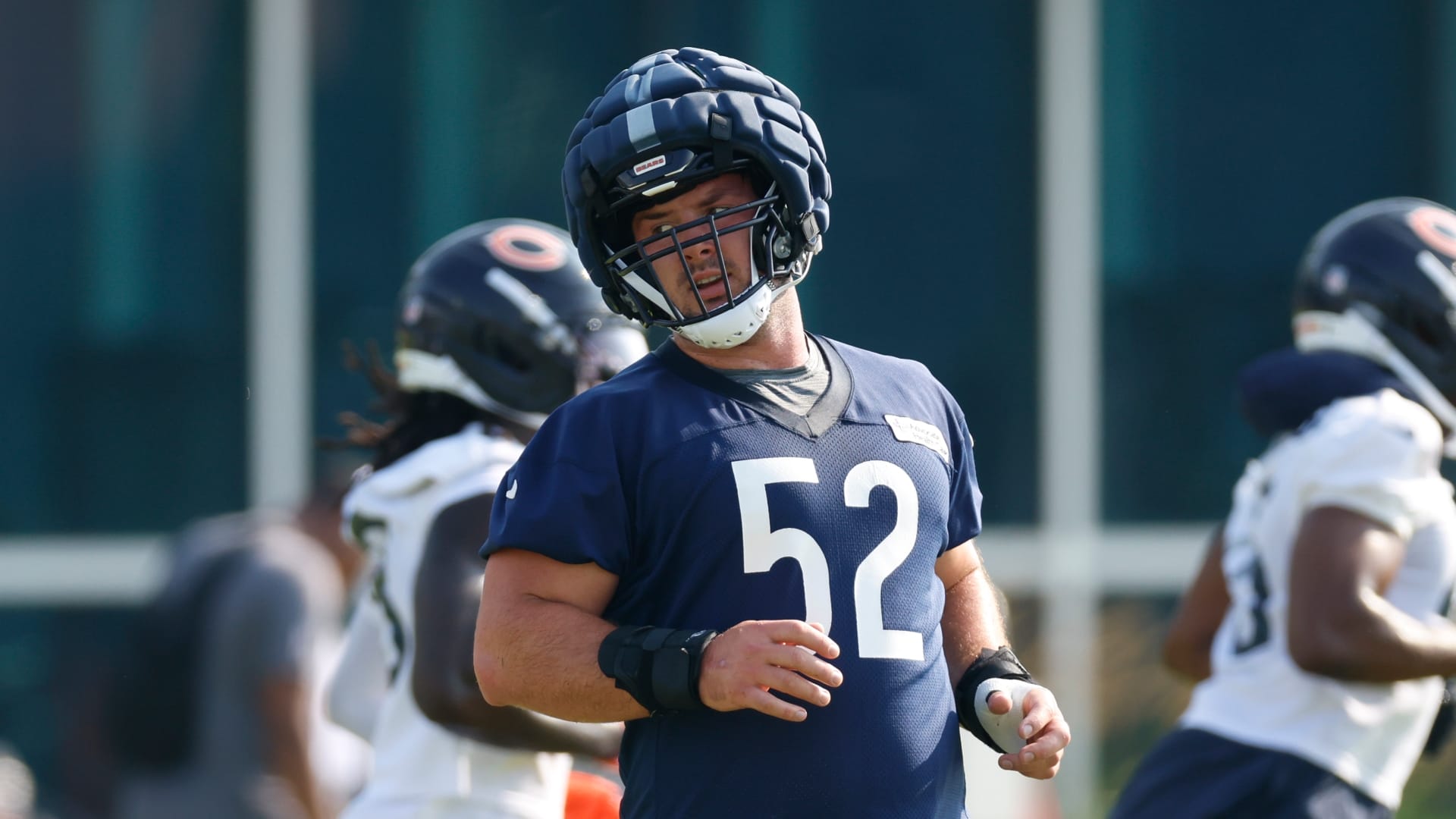 Chicago Bears center Drew Dalman (52) runs during training camp at Halas Hall.