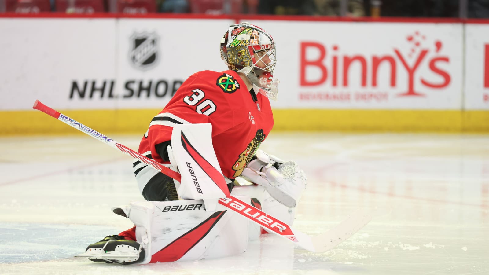 Apr 6, 2025; Chicago, Illinois, USA; Chicago Blackhawks goaltender Spencer Knight (30) warms up before the second period against the Pittsburgh Penguins at United Center.