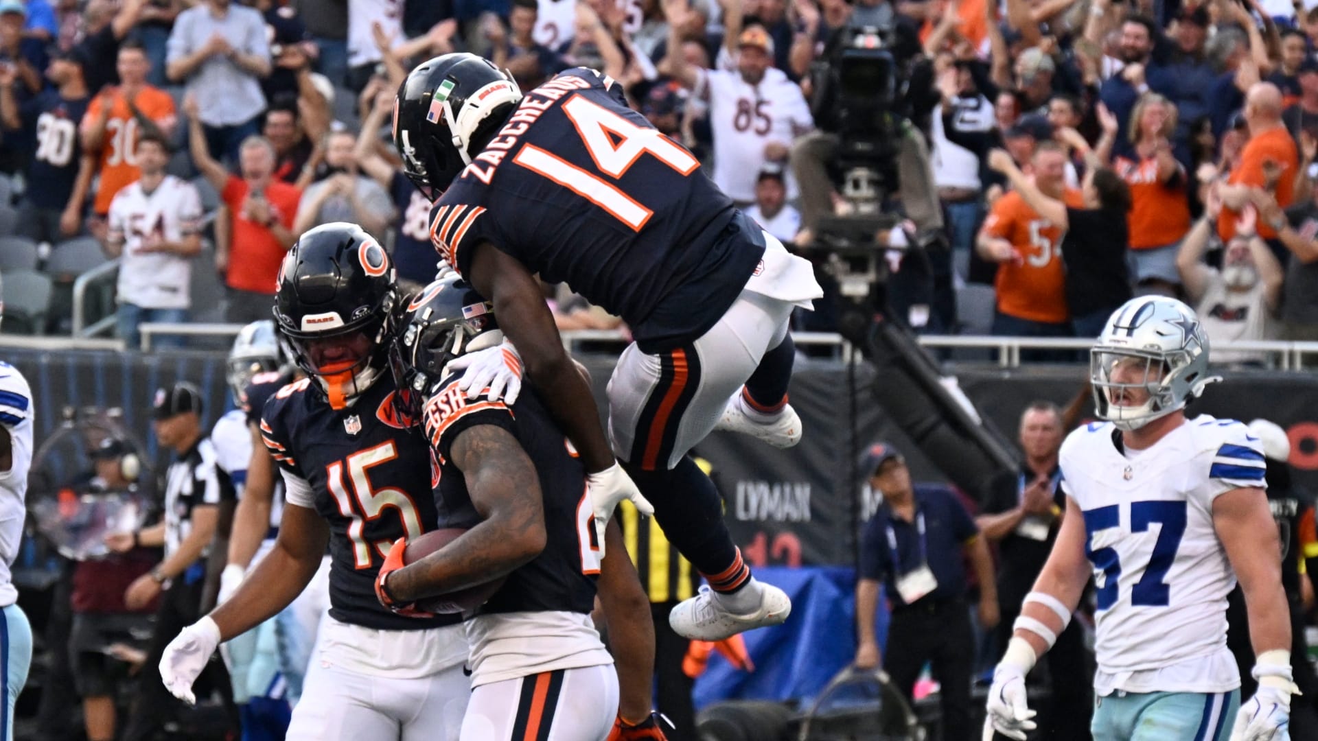 Sep 21, 2025; Chicago, Illinois, USA; Chicago Bears wide receiver DJ Moore (2) reacts after scoring a touchdown against the Dallas Cowboys during the second half at Soldier Field.