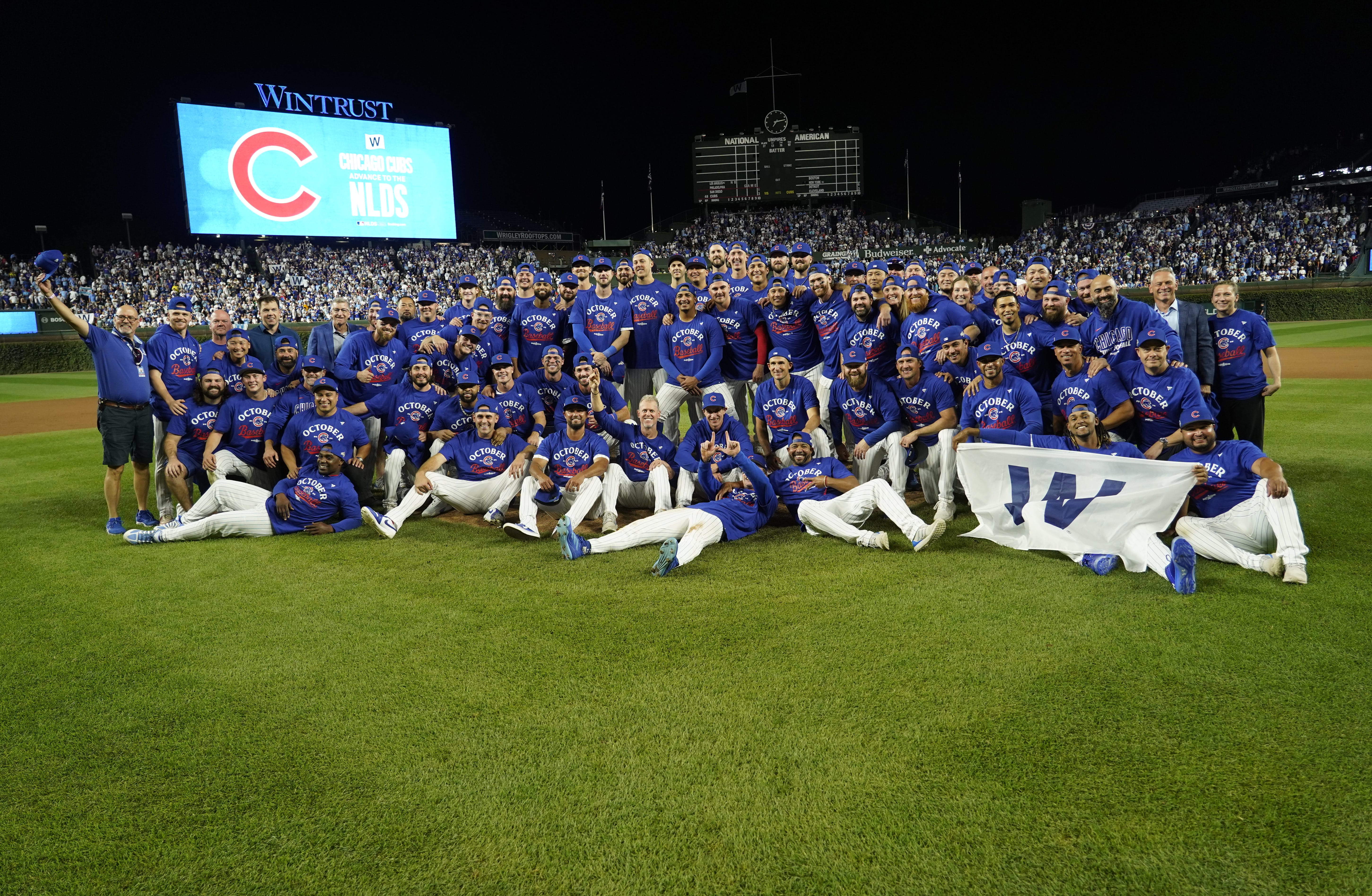 Oct 2, 2025; Chicago, Illinois, USA; The Chicago Cubs pose for a team photo after defeating the San Diego Padres to advance to the NLDS following game three of the Wildcard round for the 2025 MLB playoffs at Wrigley Field.