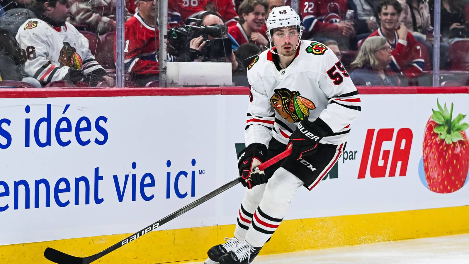 Apr 14, 2025; Montreal, Quebec, CAN; Chicago Blackhawks defenseman Artyom Levshunov (55) plays the puck in the second period at Bell Centre.