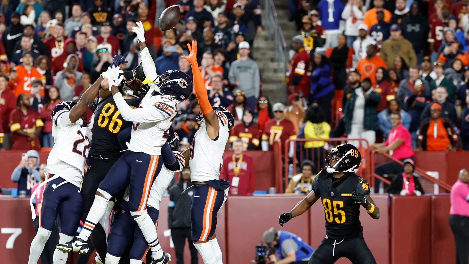 Washington Commanders wide receiver Noah Brown (85) prepares to catch a game-winnning Hail Mary pass on the final play of the game against the Chicago Bears at Northwest Stadium.