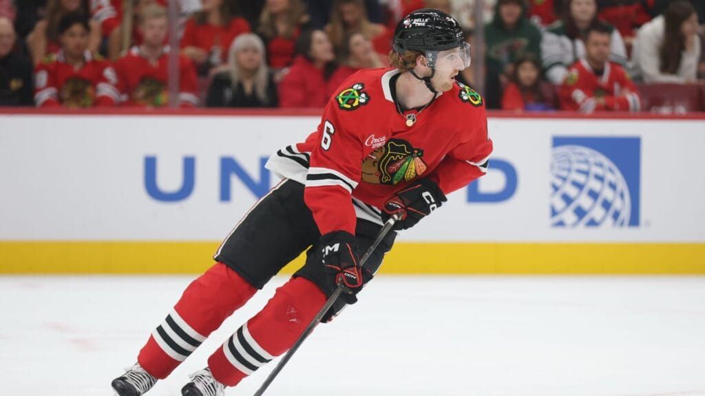 Oct 3, 2025; Chicago, Illinois, USA; Chicago Blackhawks defenseman Sam Rinzel (6) clears the puck during the second period against the Minnesota Wild at United Center.