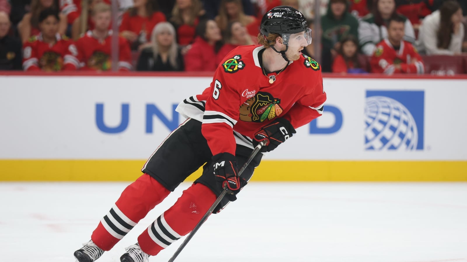 Oct 3, 2025; Chicago, Illinois, USA; Chicago Blackhawks defenseman Sam Rinzel (6) clears the puck during the second period against the Minnesota Wild at United Center.