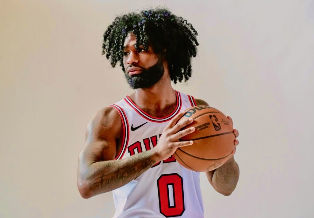 Sep 29, 2025; Chicago, IL, USA; Chicago Bulls guard Coby White (0) poses for photos during Chicago Bulls Media Day. Mandatory Credit: David Banks-Imagn Images